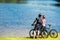 Young cyclist couple watching the lake