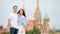 Young dating couple in love walking in city background St Basils Church