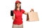 Young delivery female worker holding a paper takeaway bag and a mobile phone