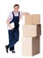 Young delivery man in overalls with cardboard boxes