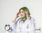 Young depressed hijab woman healthcare practitioner holding face