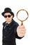 Young detective in black coat holding magnifying