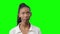 Young Disappointed African American Black Woman on a green background