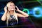 Young DJ Woman with Headphones. Happy Blonde Girl