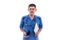 Young doctor in blue uniform takes pills from jars isolated on white background