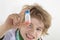 Young doctor looks at the finished vaccine in the bottle