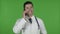 Young Doctor using Talking on Cellphone, Chroma Key