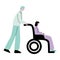 Young doctor wheeling disabled woman in wheelchair in hospital