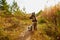 Young Dog German Shepherd in an autumn day. Puppy in yellow landscape