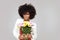 Young elegant afro girl with flowers