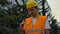 Young engineer in glasses smiling wear a safety helmet being happy about the results of his work.