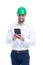 Young engineer man in green helmet using tablet isolated