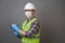 Young engineer worker wear a white helmet and medical mask