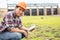 Young engineer working on site at the dam