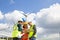 Young engineers and workers having a meeting at wind farm