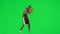 Young ethnic man boxing against green screen footage