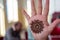 Young fair indian girl with small mehendi design on her hand