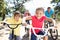 Young family on country bike ride