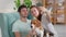 Young family couple with dog makes selfie in armchair Spbi