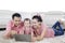 Young family enjoying leisure time with a laptop