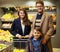 Young family in grocery store