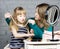 Young family mother and daughter make up at mirror