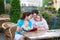 Young family at an outside cafe