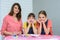 Young family plays board games and looked into the frame