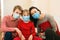 Young family in safety medical masks. Prevention coronavirus. Stay at home. Home quarantine