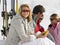 Young Family Sharing A Picnic On Ski Vacation