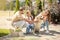 Young family stroking their pet and looking happy