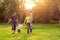 Young family together enjoying in park