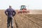 Young farmer on farmland