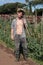 A young farmer in his vegetable garden