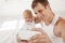 Young father with his nine months old son on the