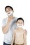 Young father and his son shaving beard