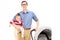 Young father holding his baby daughter and baby stroller