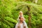 Young Father with little daughter on his shoulders. Mount Manaia.