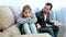 Young father quarrelling with his daughter teenager at home