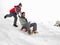 Young Father And Son Sledding