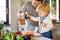 Young father with a toddler boy cooking.