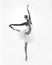 Young female ballet dancer on a light grey background