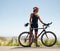 Young female cyclist looking away