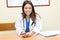 Young female doctor in her studio