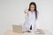 Young female doctor holding a white clock. Concept of health care Easier than treating illnesses