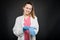 Young female doctor portrait taking her sterile gloves