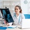 Young female doctor radiologist working in the clinic