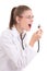 Young female doctor screaming in stethoscope isolated on white