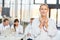 Young female doctor with stethoscope as internist