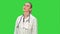 Young female doctor tired, yawning and suffering from headache on a Green Screen, Chroma Key.